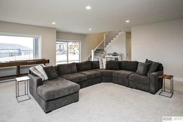 living room with light colored carpet