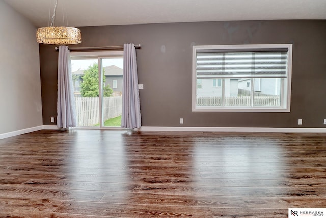 spare room featuring hardwood / wood-style flooring