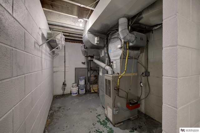 utility room with heating unit