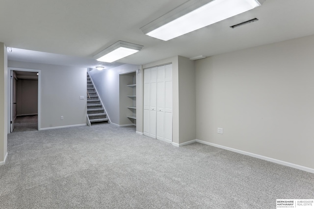 basement with carpet flooring