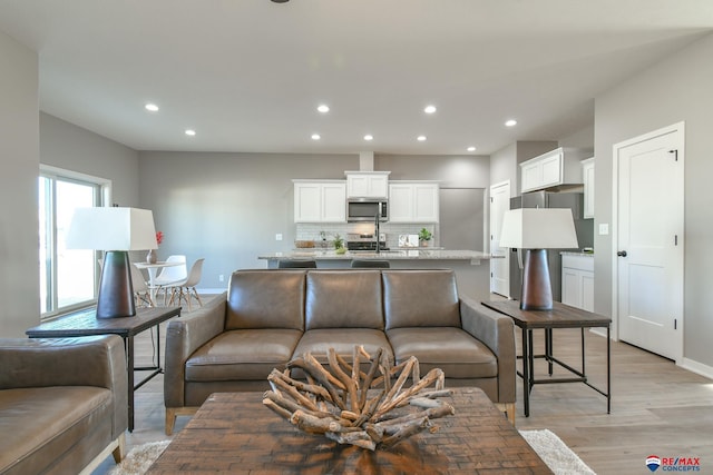 living room featuring light hardwood / wood-style flooring