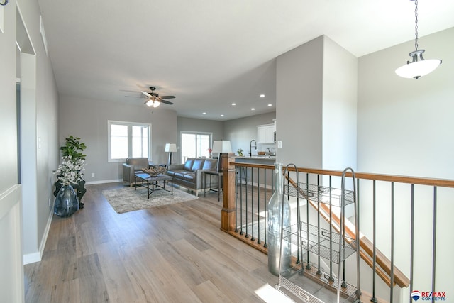 interior space with sink and light hardwood / wood-style floors