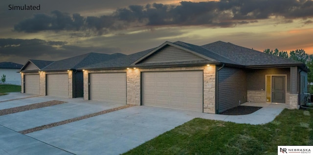 view of front of property with a garage