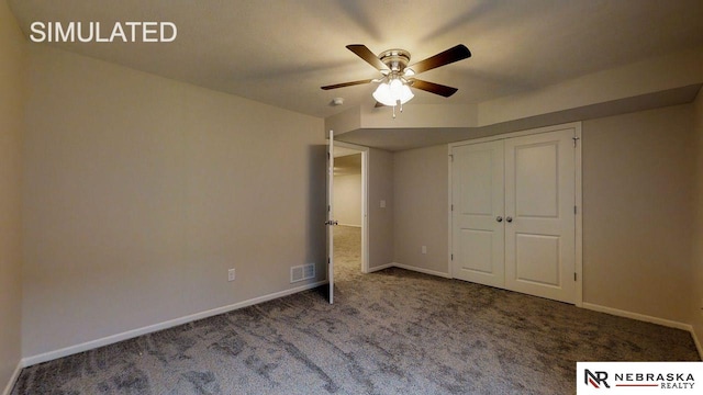 unfurnished bedroom featuring ceiling fan and carpet flooring