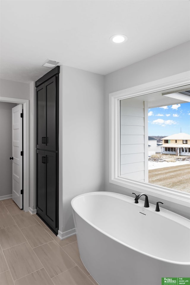 bathroom featuring a bathing tub