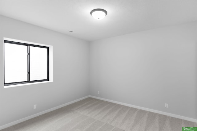 empty room with carpet flooring