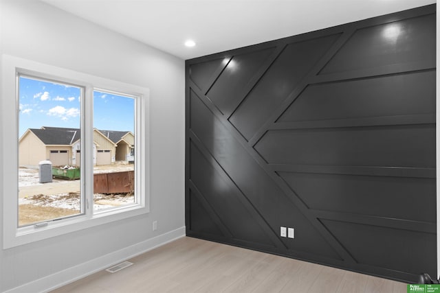 empty room featuring light hardwood / wood-style floors