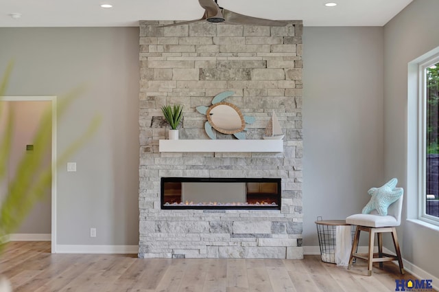 unfurnished living room with light hardwood / wood-style flooring and a fireplace