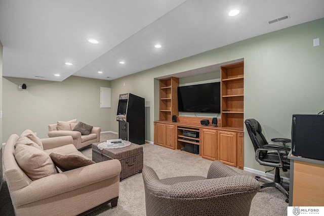 carpeted living room featuring built in features