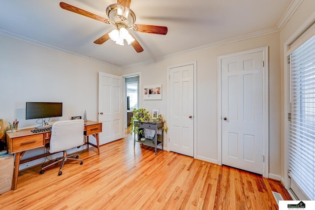 office space featuring crown molding, light hardwood / wood-style flooring, and ceiling fan