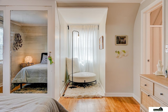 bedroom with light hardwood / wood-style flooring