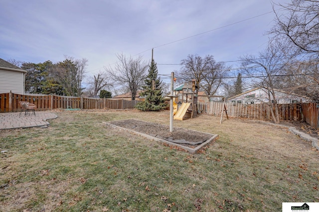 view of yard with a playground