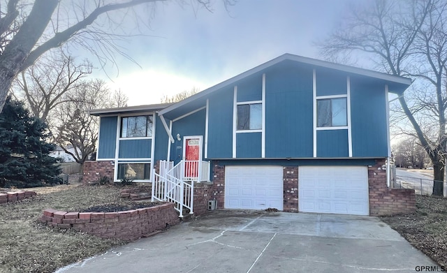 split foyer home featuring a garage