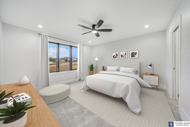 carpeted bedroom with ceiling fan