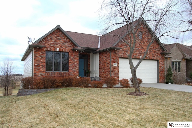 view of front of property featuring a garage and a front lawn