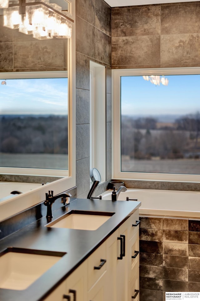 bathroom with vanity and tile walls