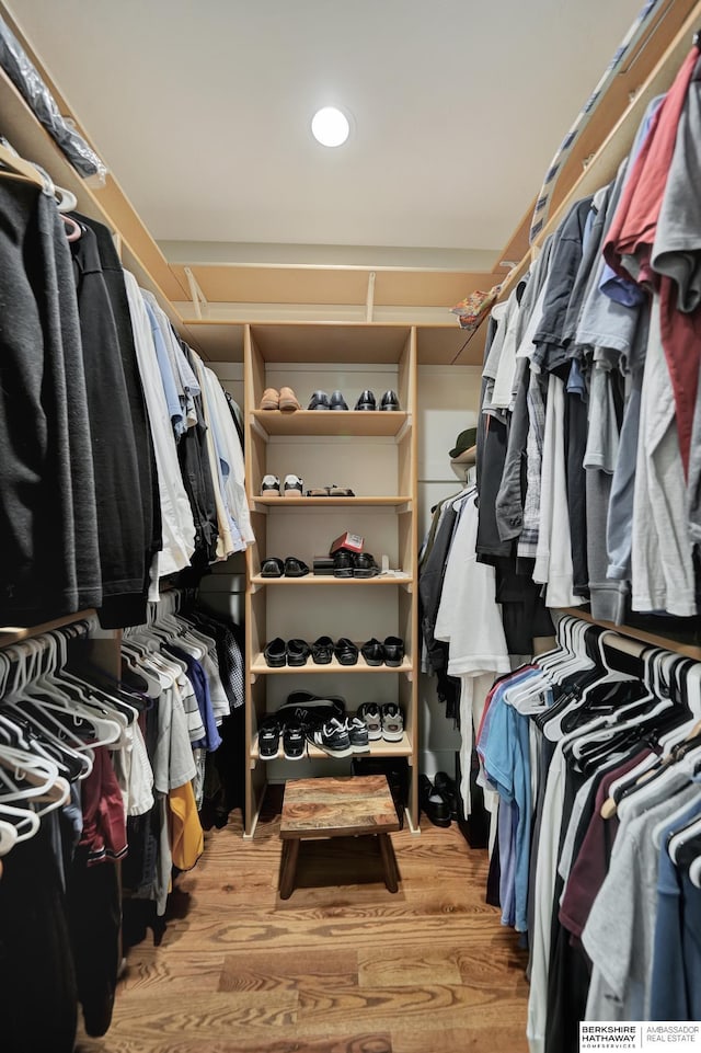 walk in closet featuring light hardwood / wood-style floors