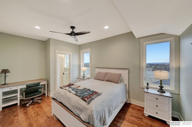 bedroom with ceiling fan and light hardwood / wood-style floors