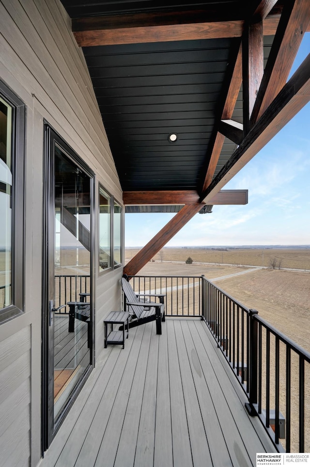 wooden terrace with a rural view