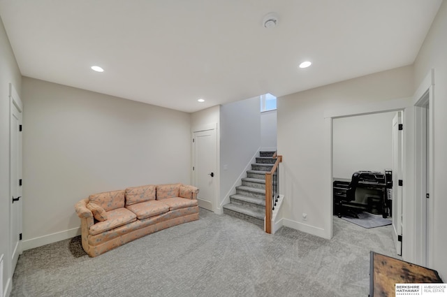 living room featuring light colored carpet