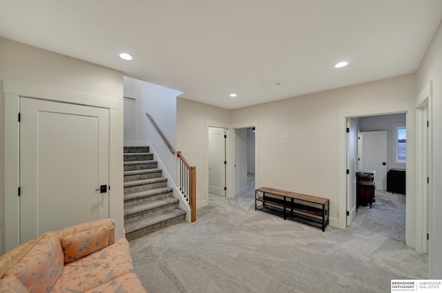 interior space featuring light colored carpet