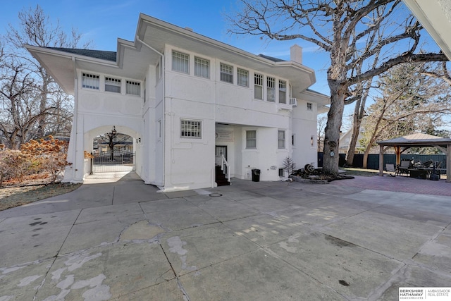 view of front of home with a gazebo