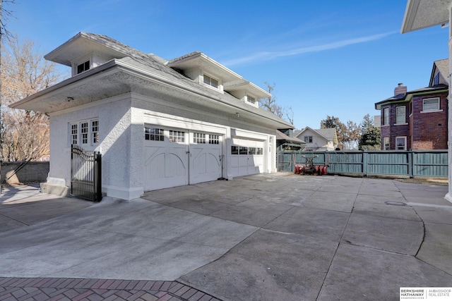 view of property exterior featuring a garage