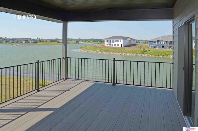 wooden deck with a water view