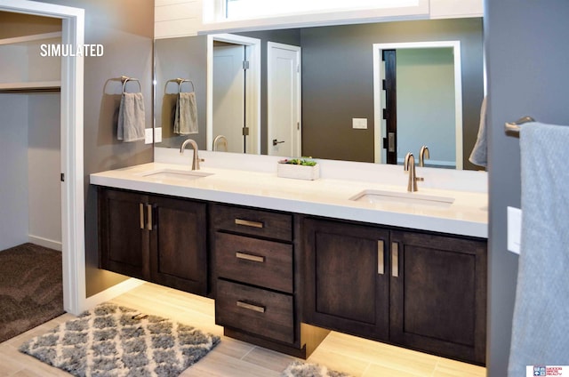 bathroom featuring vanity and wood-type flooring