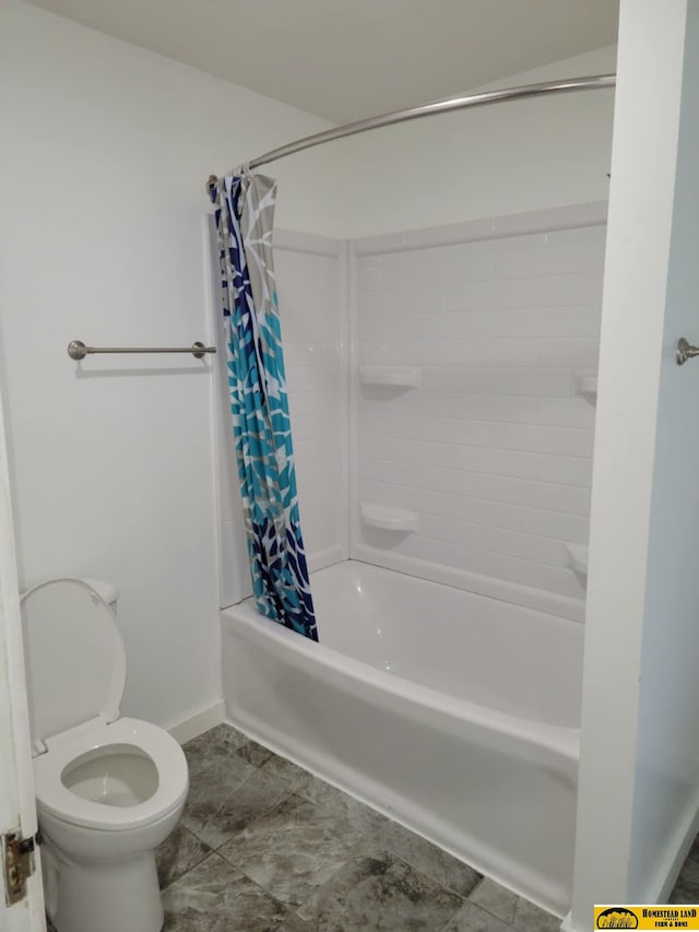 bathroom with toilet and shower / bath combo with shower curtain