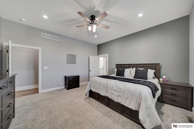 carpeted bedroom featuring ceiling fan