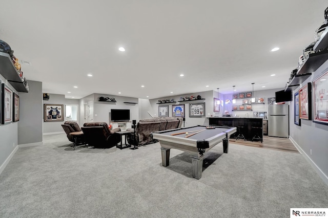 game room with bar, pool table, and light carpet