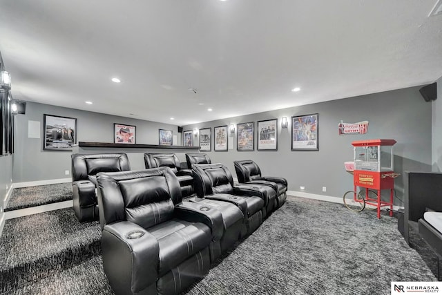 cinema room featuring carpet