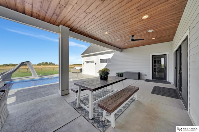 view of patio with ceiling fan