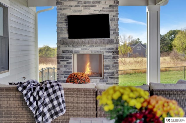 view of patio / terrace with an outdoor fireplace