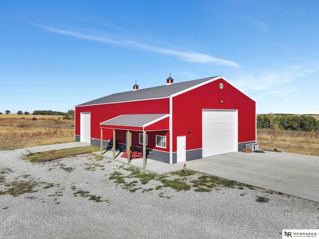 view of outbuilding with a garage