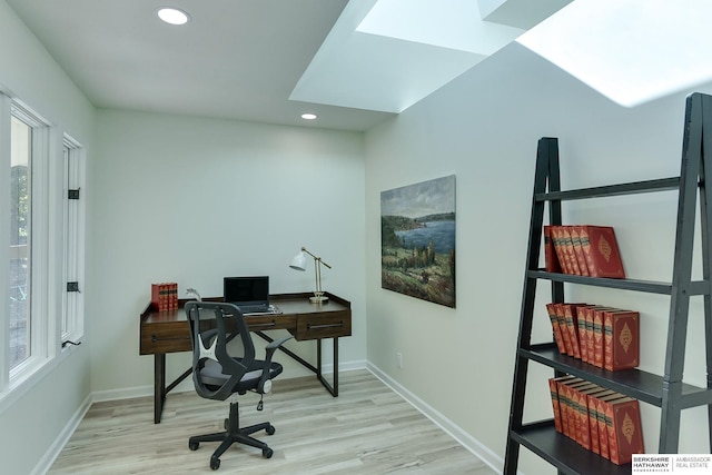 home office with light wood-type flooring