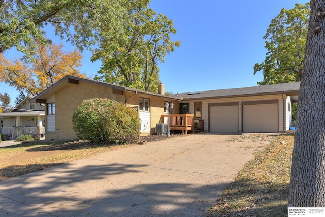 ranch-style house featuring a garage