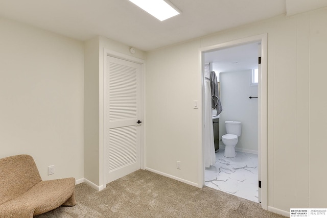 interior space featuring light colored carpet