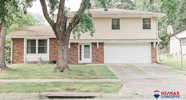 view of front facade featuring a garage and a front lawn