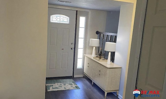 entryway featuring dark hardwood / wood-style floors