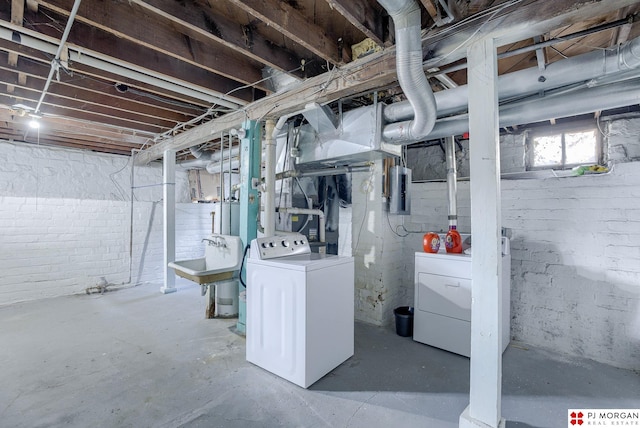 basement with separate washer and dryer