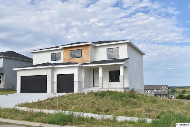 view of front of home with a garage