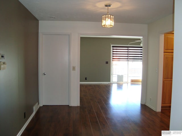 interior space with dark hardwood / wood-style floors