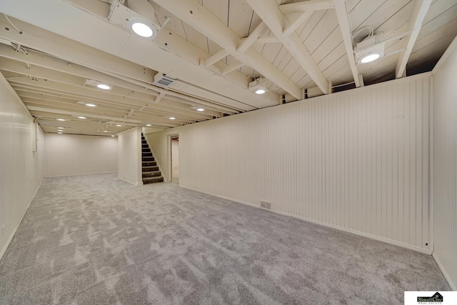 basement with light carpet