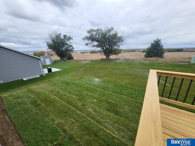 view of yard with a rural view