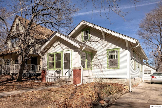 view of front of house featuring a sunroom