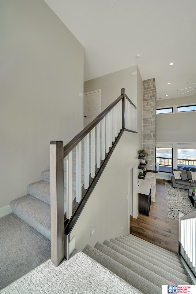 stairway with wood-type flooring