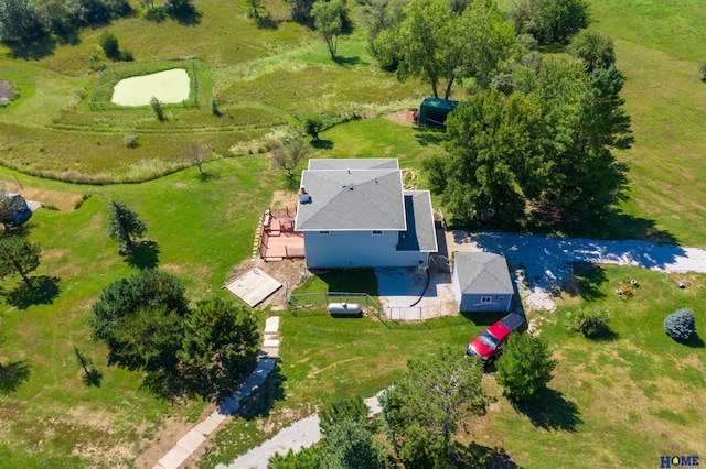 birds eye view of property with a rural view