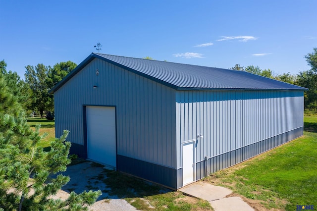 view of outbuilding with a garage